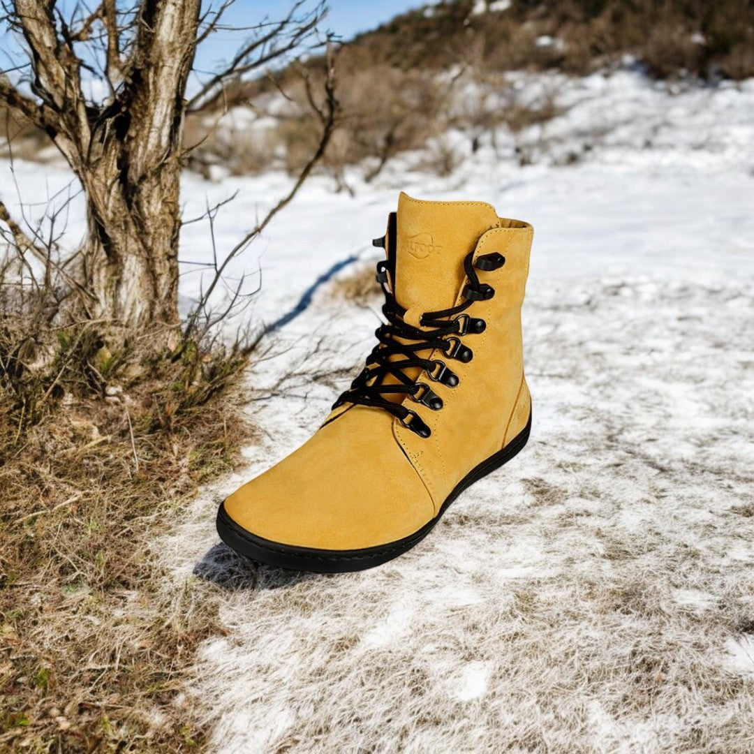 Handcrafted RealFoot Farmer Winter Boots with wide toe box and insulation, offering natural comfort and warmth for winter.