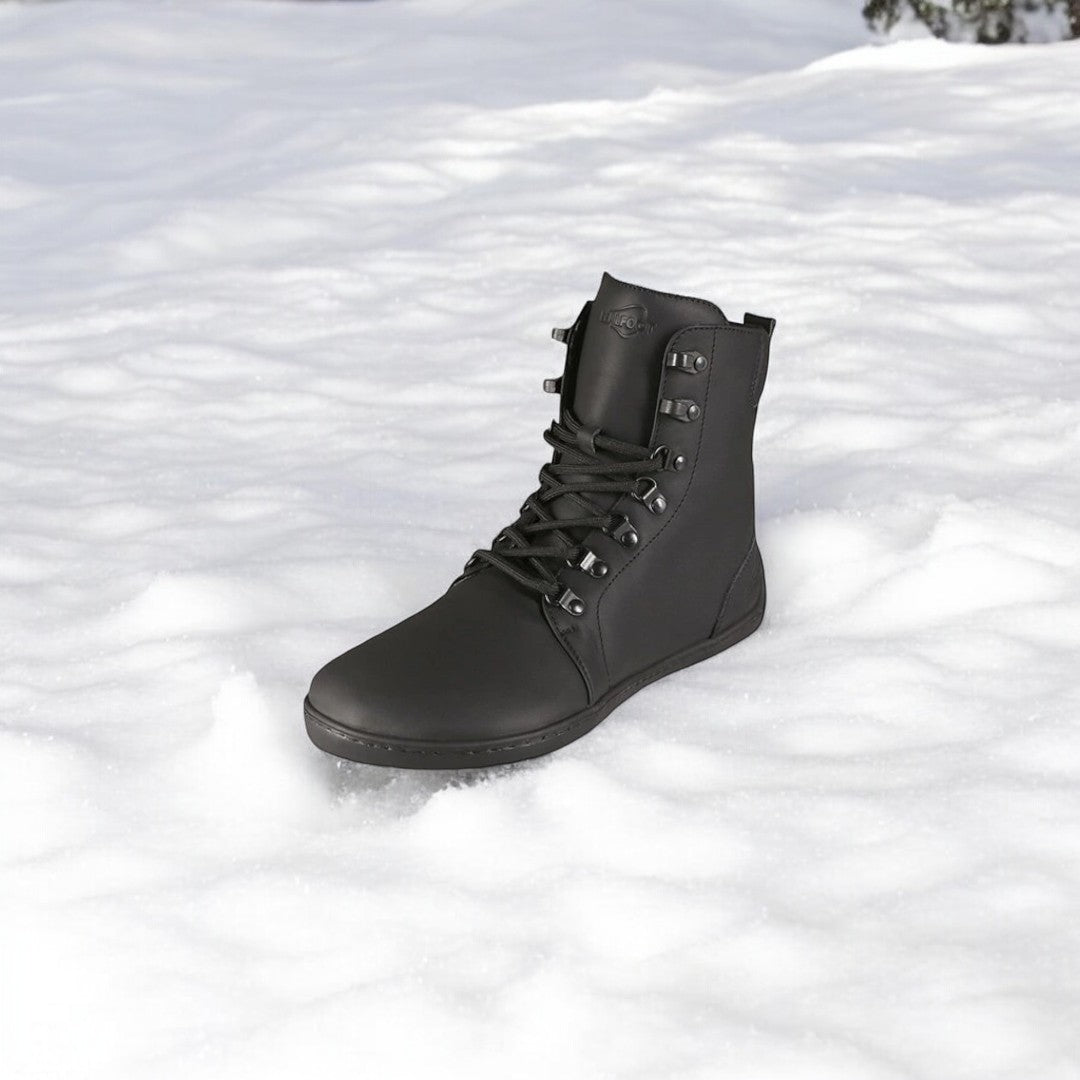 Handcrafted RealFoot Farmer Winter Boots with wide toe box and insulation, offering natural comfort and warmth for winter.