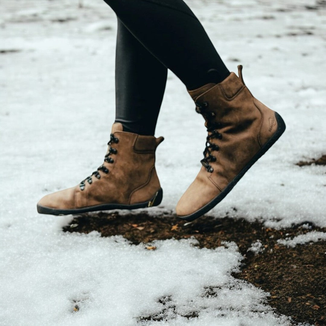 Handcrafted RealFoot Farmer Winter Boots with wide toe box and insulation, offering natural comfort and warmth for winter.