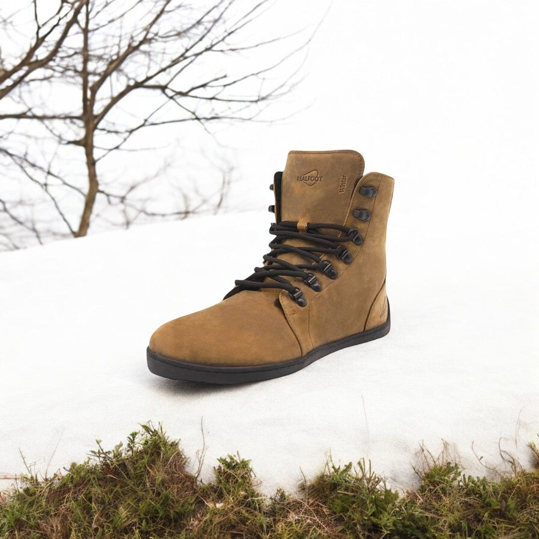 Handcrafted RealFoot Farmer Winter Boots with wide toe box and insulation, offering natural comfort and warmth for winter.