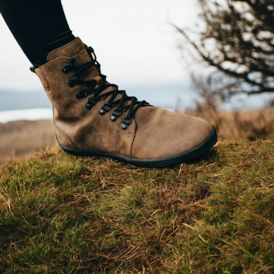 Handcrafted RealFoot Farmer Winter Boots with wide toe box and insulation, offering natural comfort and warmth for winter.